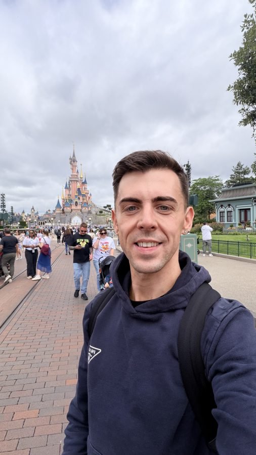 Jake in front of Sleeping Beauty Castle at Disneyland Park