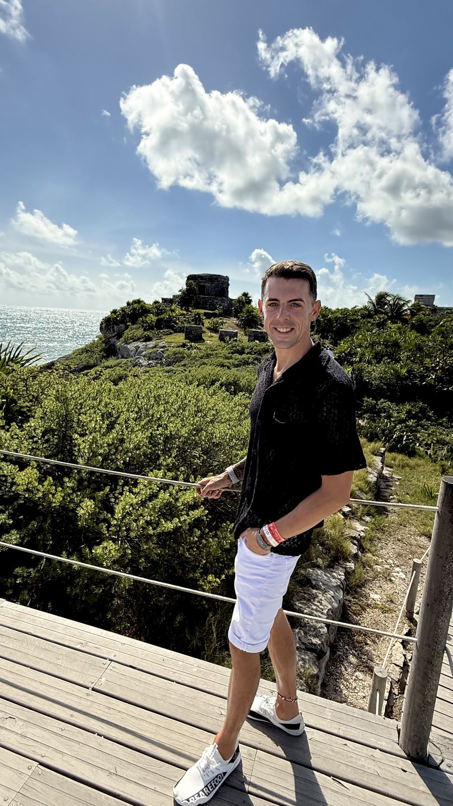 Jake at the Tulum ruins overlooking the Caribbean Sea